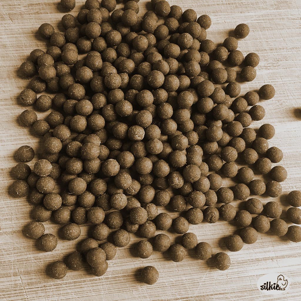 Honey-bound herbal pills used in Silkie Herbs Lipoma Digestive Support formula showing pill size, appearance, and traditional preparation